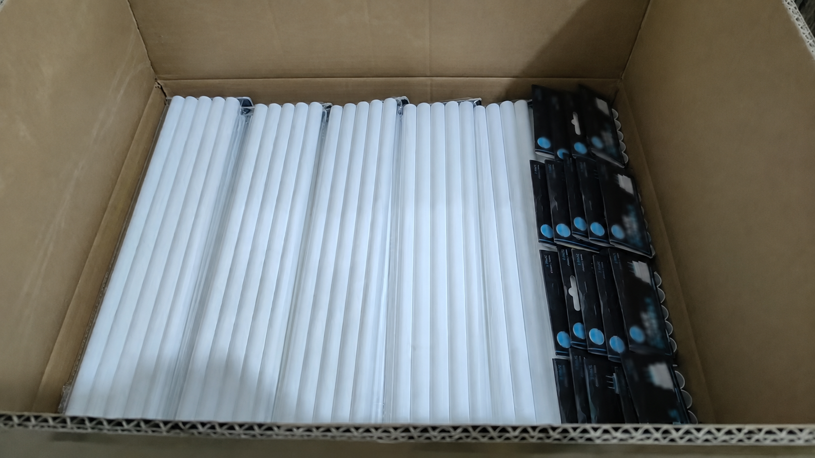 White cake dowels prepared in custom private-label packaging